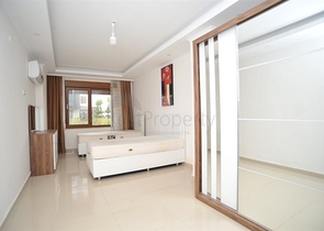 دوبلكس ارضية 3 غرف وصالة -ضمن مجمع سكني حديث -في منطقة كاستل / الانيا 