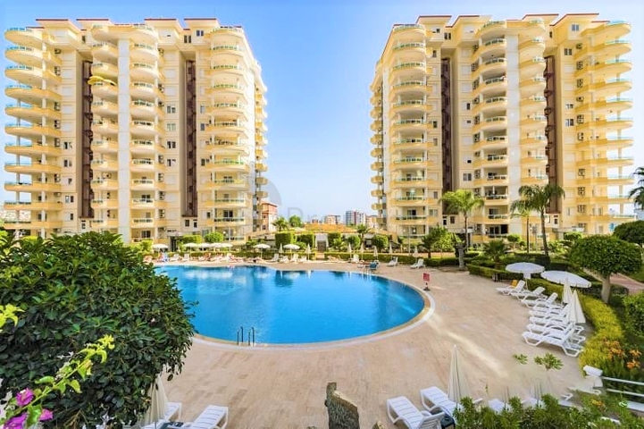 شقة واسعة في الانيا - غرفتين وصالة مفروشة -ضمن مجمع سكني في محمودلار / الانيا 