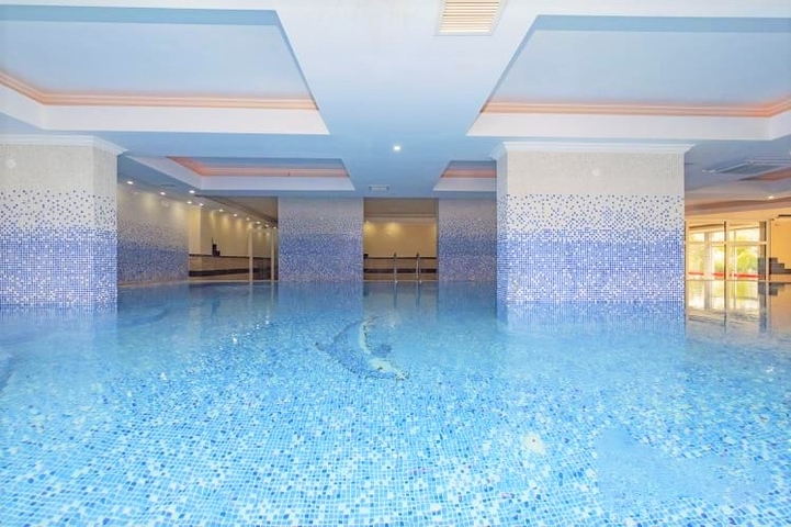 شقة واسعة في الانيا - غرفتين وصالة مفروشة -ضمن مجمع سكني في محمودلار / الانيا 