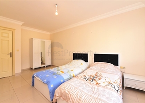 شقة واسعة في الانيا - غرفتين وصالة مفروشة -ضمن مجمع سكني في محمودلار / الانيا 