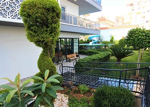 شقة واسعة - غرفتين وصالة مفروشة -ضمن مجمع - في محمودلار / الانيا 