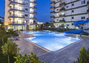 شقة واسعة - غرفتين وصالة مفروشة -ضمن مجمع - في محمودلار / الانيا 