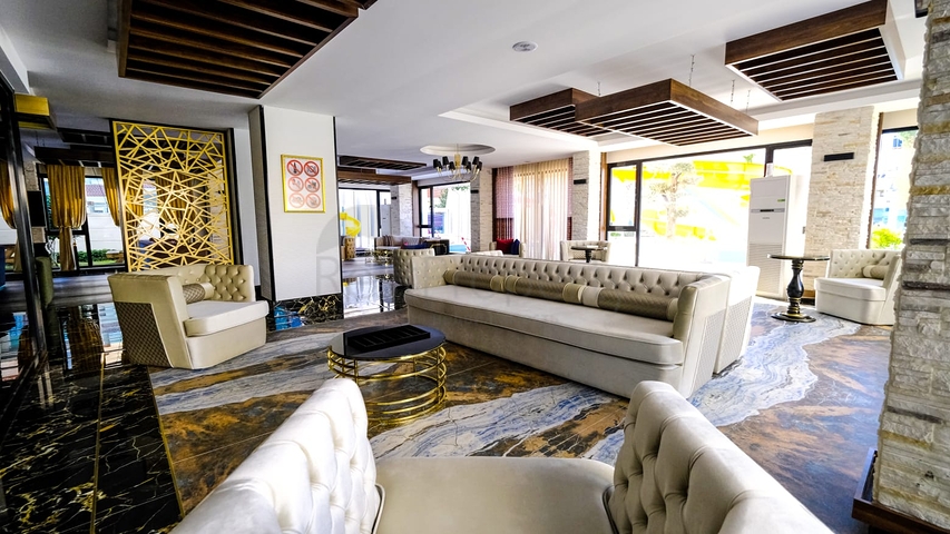 مجمع بخدمات 5 نجوم - شقة غرفتين  وصالة مفروشة - في محمودلار/ الانيا