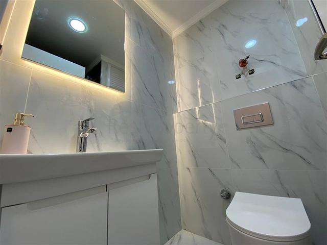 شقق اطلالة على البحر في الانيا - تصميم غرفة وصالة مفروشة - في كارجيجاك / الانيا 