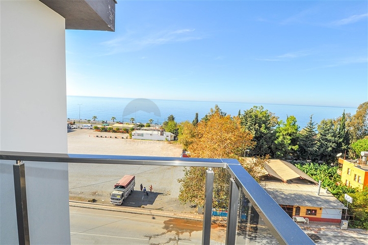 شقق اطلالة على البحر في الانيا - تصميم غرفة وصالة مفروشة - في كارجيجاك / الانيا 