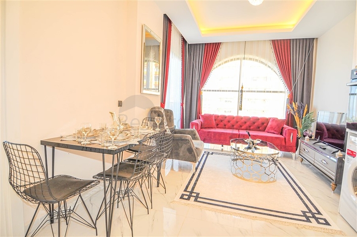 شقق اطلالة على البحر في الانيا - تصميم غرفة وصالة مفروشة - في كارجيجاك / الانيا 