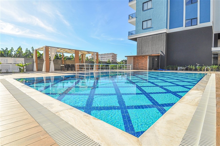 شقق اطلالة على البحر في الانيا - تصميم غرفة وصالة مفروشة - في كارجيجاك / الانيا 