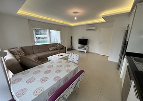 اطلالة بحر -شقة 2 غرفة وصالة مفروشة - ضمن مجمع يضم خدمات 5 نجوم - في افسلار / الانيا 