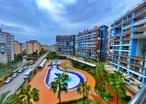 خلف مول الانيوم - شقة غرفة وصالة مفروشة - مجمع فاخر - في جيكجلي / الانيا 