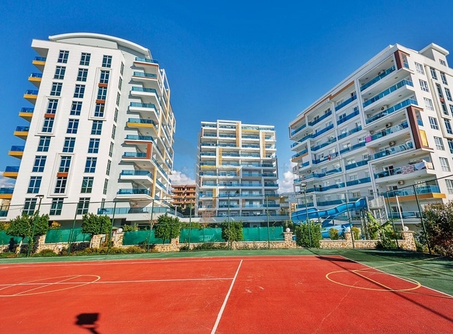 ضمن مجمع فاخر - شقة غرفتين وصالة -مطبخ منفصل - في توسمور / الانيا 