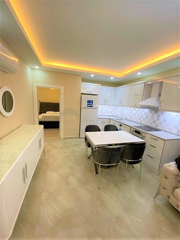 شقة غرفتين وصالة مفروشة -مجمع حديث -في محمودلار/ الانيا 