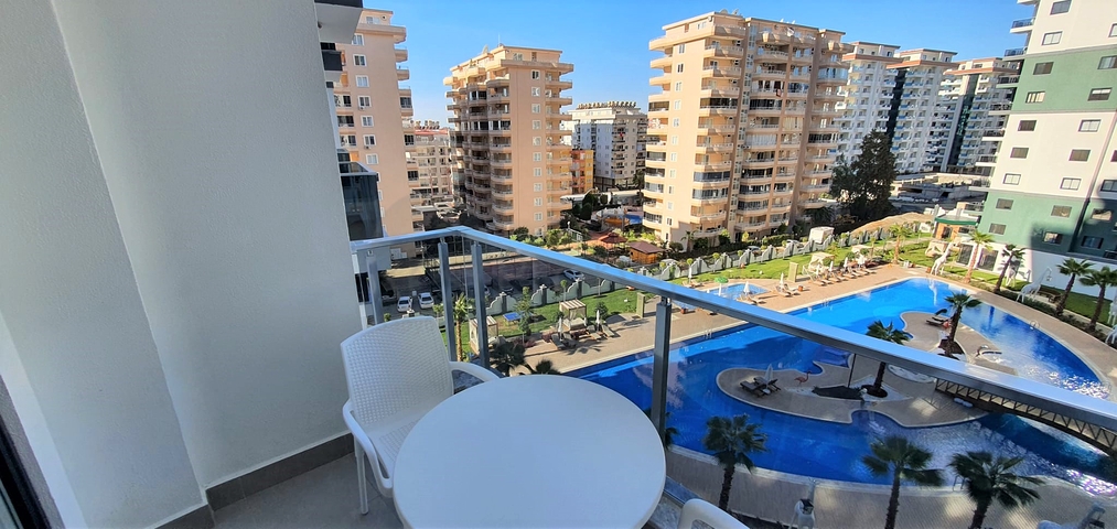 شقة غرفة وصالة ضمن مجمع 5 نجوم -في محمودلار / الانيا 