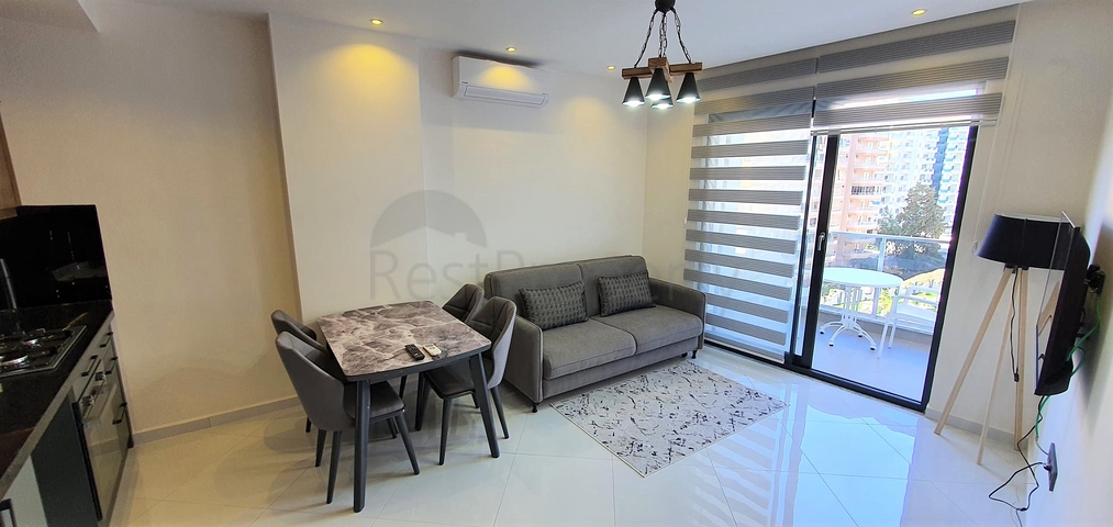 شقة غرفة وصالة ضمن مجمع 5 نجوم -في محمودلار / الانيا 