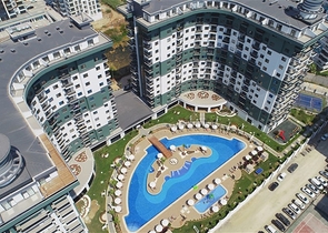 شقة غرفة وصالة ضمن مجمع 5 نجوم -في محمودلار / الانيا 