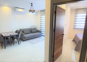 شقة غرفة وصالة ضمن مجمع 5 نجوم -في محمودلار / الانيا 