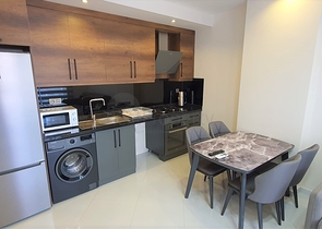 شقة غرفة وصالة ضمن مجمع 5 نجوم -في محمودلار / الانيا 