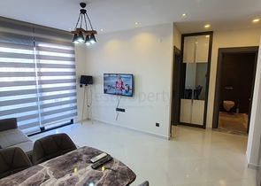 شقة غرفة وصالة ضمن مجمع 5 نجوم -في محمودلار / الانيا 