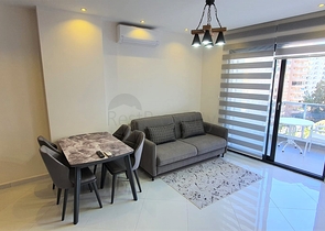 شقة غرفة وصالة ضمن مجمع 5 نجوم -في محمودلار / الانيا 