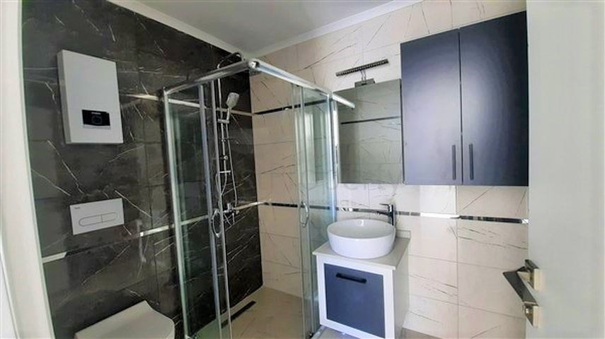 شقة غرفة وصالة ضمن مجمع حديث -قريب من البحر والخدمات -في افسلار / الانيا 