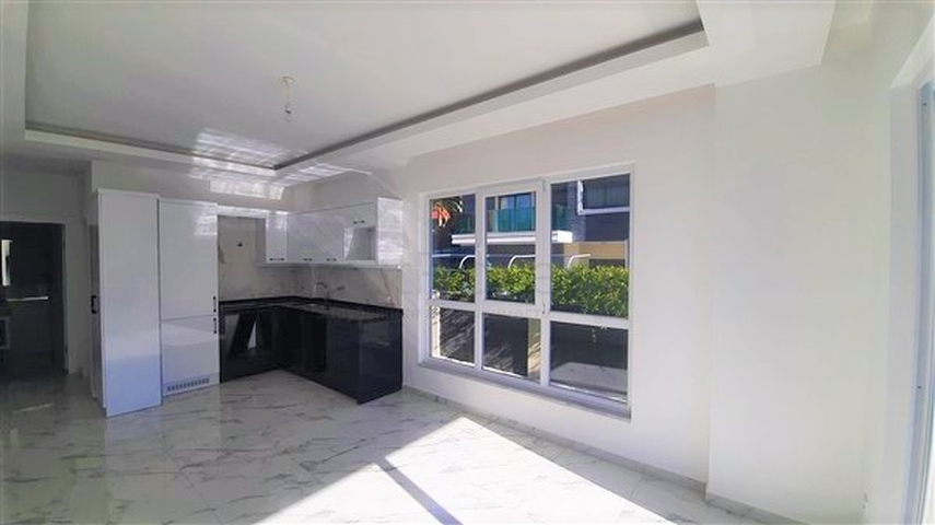 شقة غرفة وصالة ضمن مجمع حديث -قريب من البحر والخدمات -في افسلار / الانيا 