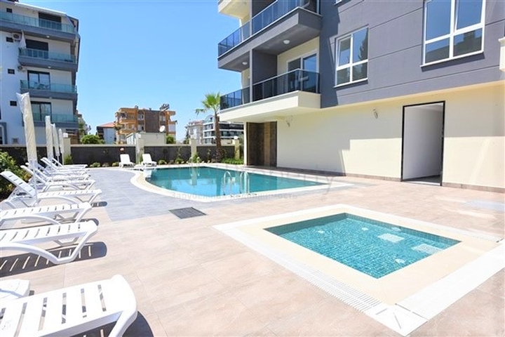 شقة غرفة وصالة ضمن مجمع حديث -قريب من البحر والخدمات -في افسلار / الانيا 