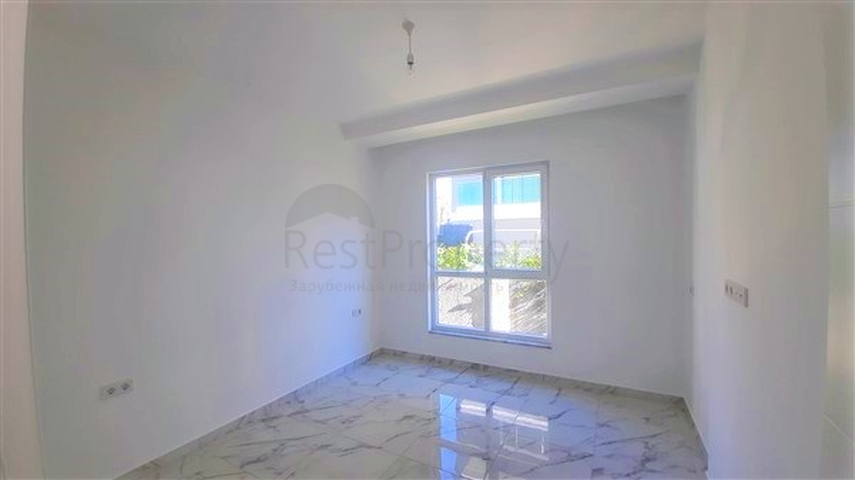 شقة غرفة وصالة ضمن مجمع حديث -قريب من البحر والخدمات -في افسلار / الانيا 