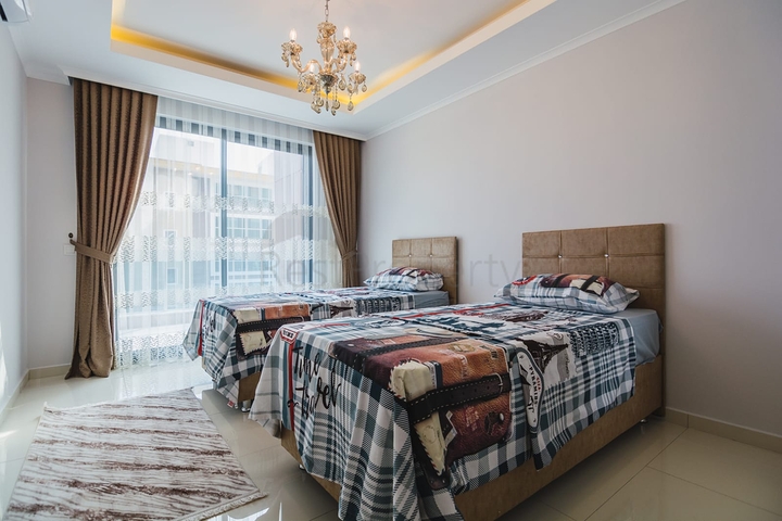 شقة عائلية واسعة -3 غرف وصالة -مفروشة -ضمن مجمع حديث - في محمودلار / الانيا 