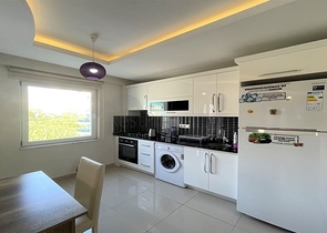 شقة غرفة وصالة مفروشة - ضمن مجمع سكني في محمودلار/ الانيا 