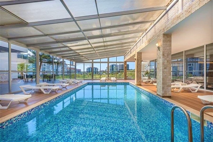 تراس واسع - شقة غرفتين وصالة مفروشة -ضمن مجمع حديث في كاستل / الانيا 