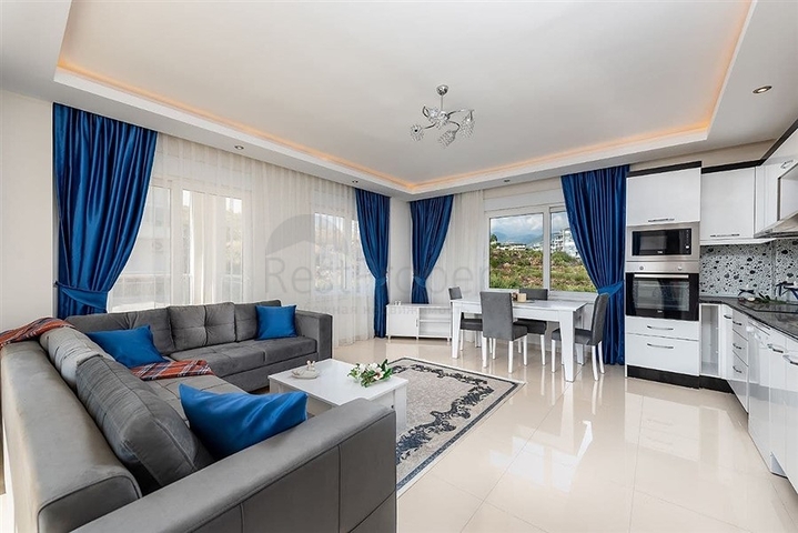 تراس واسع - شقة غرفتين وصالة مفروشة -ضمن مجمع حديث في كاستل / الانيا 