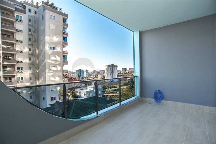 شقة غرفة وصالة -ضمن مجمع سكني حديث - في محمودلار / الانيا 