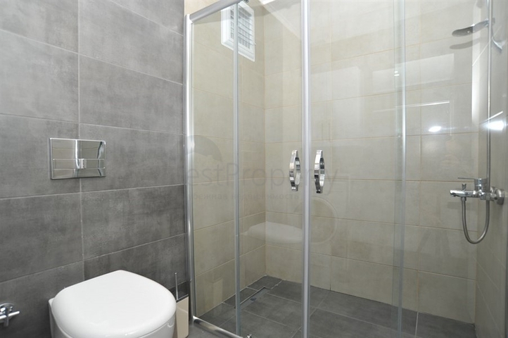 شقة غرفة وصالة -ضمن مجمع سكني حديث - في محمودلار / الانيا 