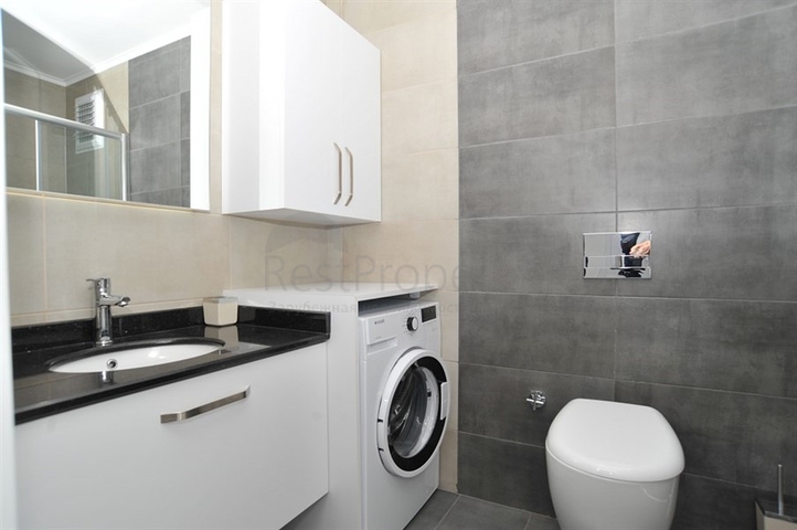 شقة غرفة وصالة -ضمن مجمع سكني حديث - في محمودلار / الانيا 