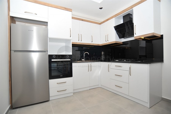 شقة غرفة وصالة -ضمن مجمع سكني حديث - في محمودلار / الانيا 