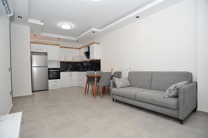 شقة غرفة وصالة -ضمن مجمع سكني حديث - في محمودلار / الانيا 