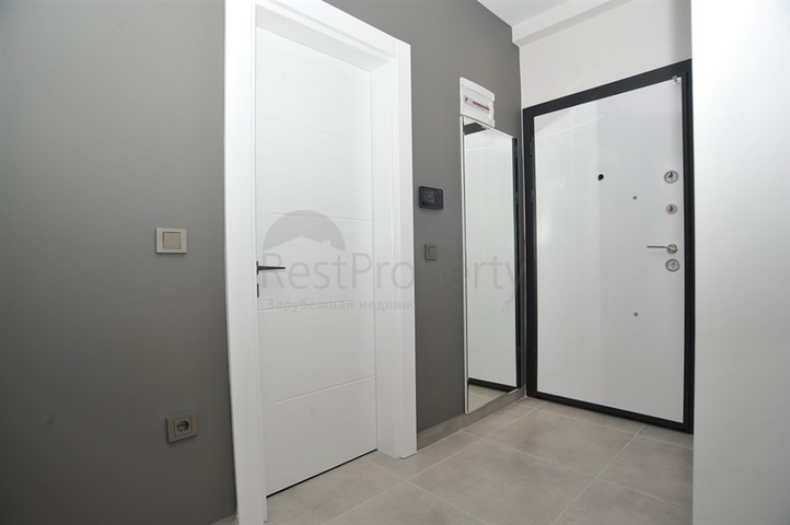 شقة غرفة وصالة -ضمن مجمع سكني حديث - في محمودلار / الانيا 