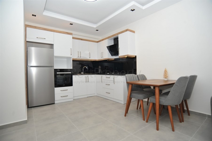 شقة غرفة وصالة -ضمن مجمع سكني حديث - في محمودلار / الانيا 