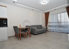 شقة غرفة وصالة -ضمن مجمع سكني حديث - في محمودلار / الانيا 