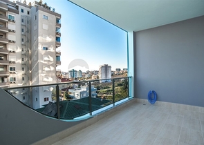 شقة غرفة وصالة -ضمن مجمع سكني حديث - في محمودلار / الانيا 