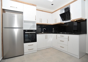 شقة غرفة وصالة -ضمن مجمع سكني حديث - في محمودلار / الانيا 