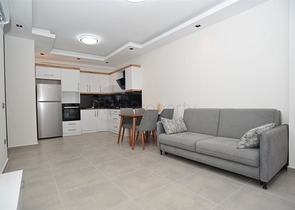 شقة غرفة وصالة -ضمن مجمع سكني حديث - في محمودلار / الانيا 