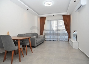 شقة غرفة وصالة -ضمن مجمع سكني حديث - في محمودلار / الانيا 