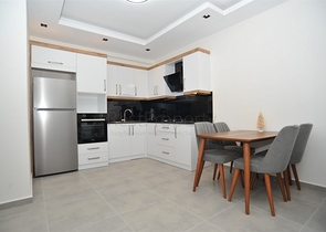 شقة غرفة وصالة -ضمن مجمع سكني حديث - في محمودلار / الانيا 