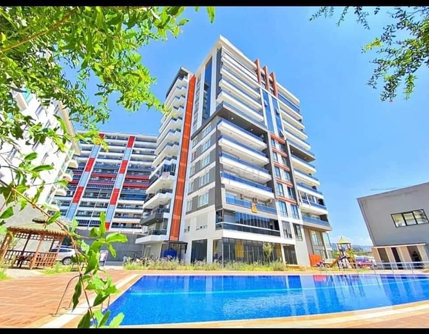 شقة 3 غرف وصالة واسعة -مطبخ منفصل - ضمن مجمع حديث - في محمودلار / الانيا 