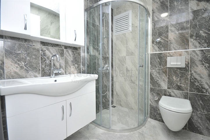 جانب المشفى الحكومي في الانيا - شقة 2 غرفة وصالة ضمن مجمع حديث في اوبا / الانيا 