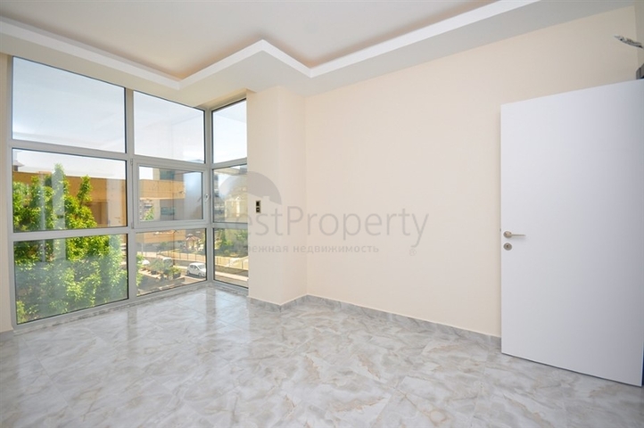 جانب المشفى الحكومي في الانيا - شقة 2 غرفة وصالة ضمن مجمع حديث في اوبا / الانيا 