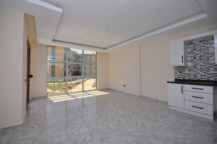 جانب المشفى الحكومي في الانيا - شقة 2 غرفة وصالة ضمن مجمع حديث في اوبا / الانيا 