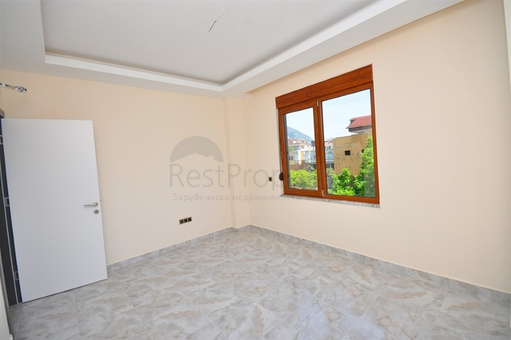 جانب المشفى الحكومي في الانيا - شقة 2 غرفة وصالة ضمن مجمع حديث في اوبا / الانيا 