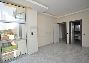 جانب المشفى الحكومي في الانيا - شقة 2 غرفة وصالة ضمن مجمع حديث في اوبا / الانيا 