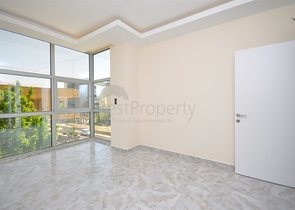 جانب المشفى الحكومي في الانيا - شقة 2 غرفة وصالة ضمن مجمع حديث في اوبا / الانيا 